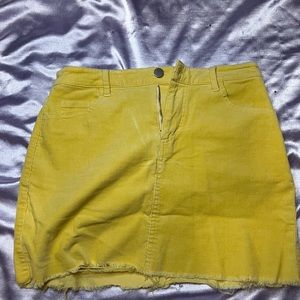 Bright yellow mini skirt